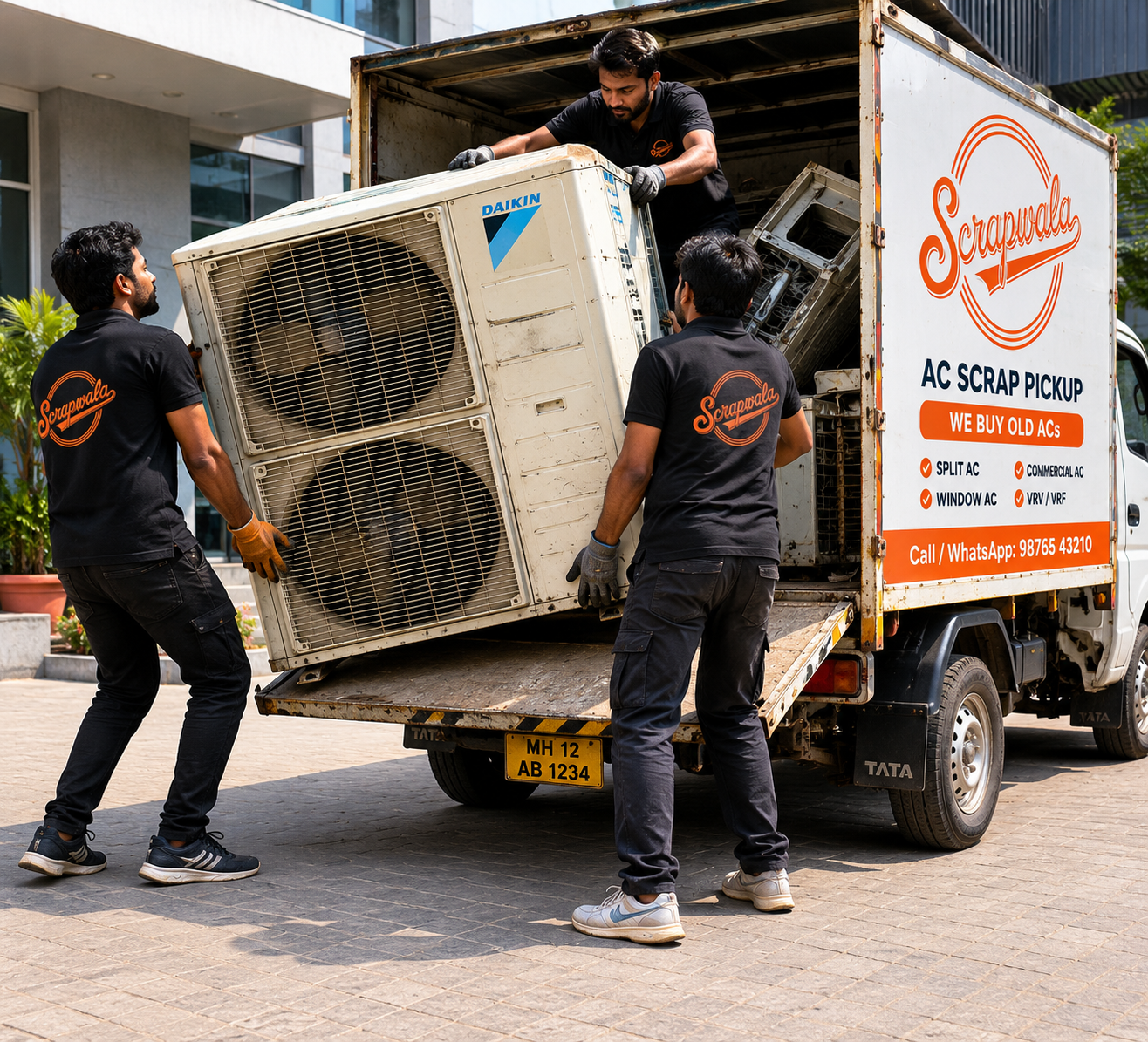 ScrapWala team unloading commercial AC unit